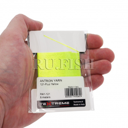 Пряжа антроновая Textreme Antron Yarn 121 Fluo Yellow, фото в руке