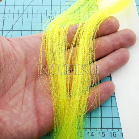 Волокна синтетические крученые Hends Krystal Flash UV 102 Fl Yellow, в руке