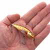 Воблер Asakura Bullhead 6 SR-SP 9.1 гр 620 на ладони