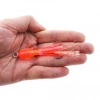 Каракатица на ассистах Striker Assist Squid Orange Pink, на ладони