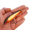 Воблер Rapala X-Rap 10 13 гр G на ладони